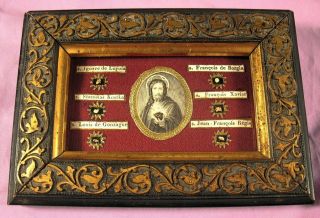 Antique Miniature French Frame With The Relics Of 6 Jesuit Saints.