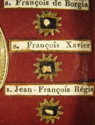 ANTIQUE MINIATURE FRENCH FRAME WITH THE RELICS OF 6 JESUIT SAINTS. 7