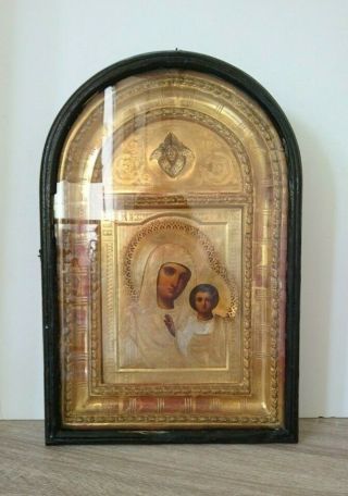Antique Russian Icon Of The Mother Of God Hand Painted On Wood In Brass Riza.