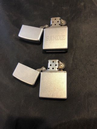 Two Zippo Lighters - Silver 2006 & 2012 F 12 & J 06