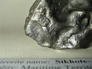 meteorite Sikhote - Alin,  Russia,  regmaglypted individual 472 g,  flow lines 7