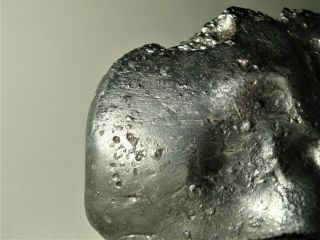 meteorite Sikhote - Alin,  Russia,  regmaglypted individual 472 g,  flow lines 8