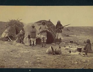 Photo Of Apaches In Camp With Rifles