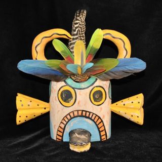 Hopi Folk Art Mask By Gregory Lomayesva,  Wood,  Feathers,  Mixed Media,  13.  25 " H