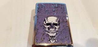 Zippo Cigarette Lighter 2005 Skull With Purple Back Ground In Order