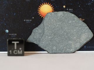 NWA 12333 meteorite - R5 (rumurutite) chondrite - 3.  35g slice 2