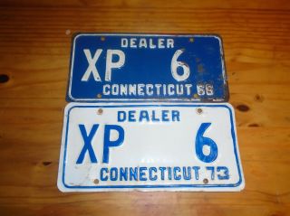 2 Vintage Ct.  Dealer License Plates 1966 And 1973