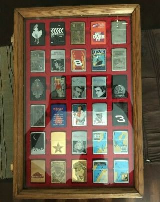 30 Zippo Lighters with Display Case - All 2