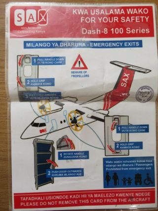 Flysax Dash 8 - 100 Airline Safety Card Laminated Poor With Fold
