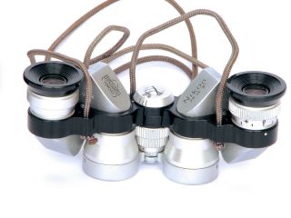 Nikon 7 x 15 pocket binoculars,  virtually 2