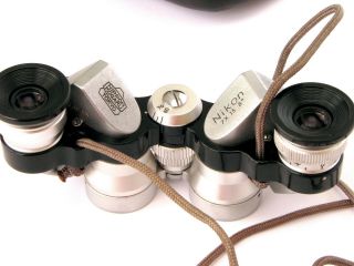 Nikon 7 x 15 pocket binoculars,  virtually 3