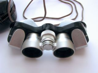Nikon 7 x 15 pocket binoculars,  virtually 4