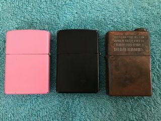 Three Zippo Lighters Pink And Black And One Copper