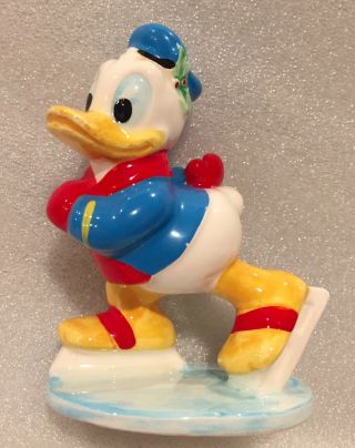 Vintage Walt Disney Japan 3.  25” Porcelain Ice Skating Donald Duck Figurine