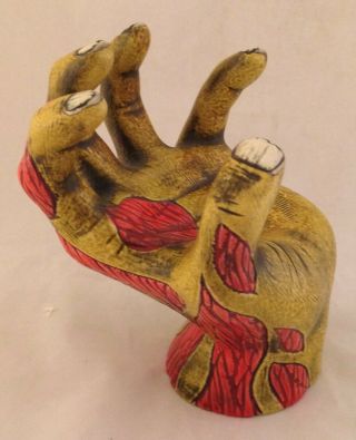 Severed Zombie Hand tiki mug mfg.  by Munktiki 2