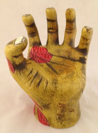 Severed Zombie Hand tiki mug mfg.  by Munktiki 3