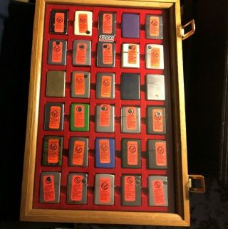 30 Zippo Lighters with Display Case 8