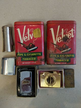 4 Vintage Cigarette Lighters,  1 Brass Match Holder,  2 Velvet Tobacco Tins