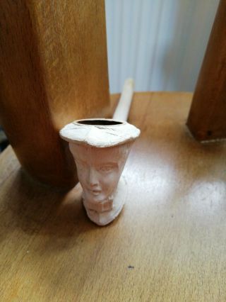 Five Antique clay pipes including rare ' Motoring Girl ' pipe and brass stand 4