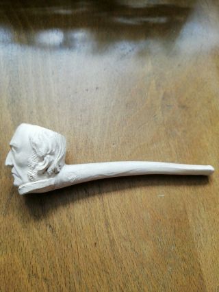 Five Antique clay pipes including rare ' Motoring Girl ' pipe and brass stand 5