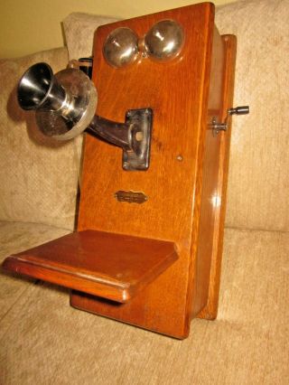 Montgomery - Ward Oak Wood Magneto Wall Telephone. 2