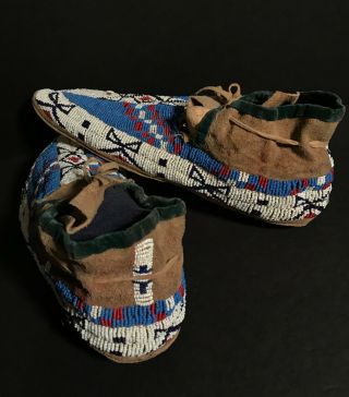 LATE 19TH C SIOUX PLAINS BEADED & SINEW SEWN MOCCASINS,  NR 10