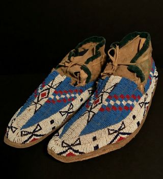 LATE 19TH C SIOUX PLAINS BEADED & SINEW SEWN MOCCASINS,  NR 7
