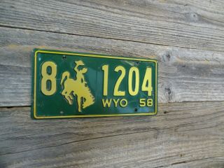 1958 Wyoming Cowboy License Passenger Plate Bucking Horse License Plate