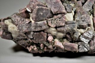 Rhodonite crystals with gahnite and calcite - Sterling Hill,  Ogdensburg,  NJ 6