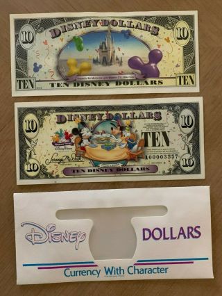 39 Disney Dollars - Mixed Years And Subjects In Currency Holders - $76.  Face Val