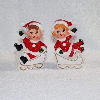 Vintage Christmas Napco Kids In Sleigh Salt And Pepper Shakers Boy Girl Figurine