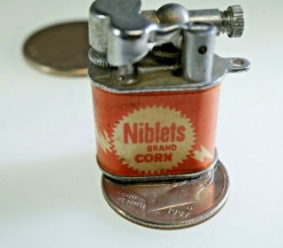Vintage Advertising Mini Lift Arm Lighter Niblets Brand Corn.