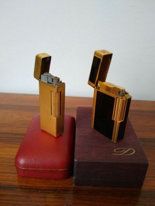 ST DUPONT LIGHTER LINE 1 LARGE GOLD LACQUER & DUNHILL ROLLAGAS GOLD.  BOXED. 2