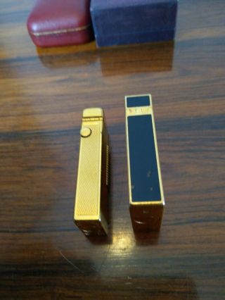 ST DUPONT LIGHTER LINE 1 LARGE GOLD LACQUER & DUNHILL ROLLAGAS GOLD.  BOXED. 4