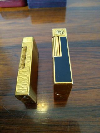 ST DUPONT LIGHTER LINE 1 LARGE GOLD LACQUER & DUNHILL ROLLAGAS GOLD.  BOXED. 6