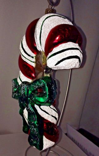 Radko Christmas Tree Ornament,  7.  5 " Glass Candy Cane Ornament With A Green Bow