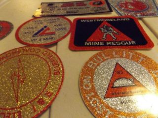 25 different old mining stickers,  they all shine 4