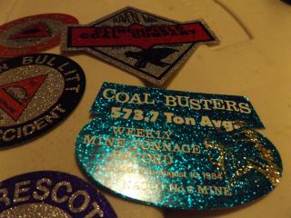 25 different old mining stickers,  they all shine 9