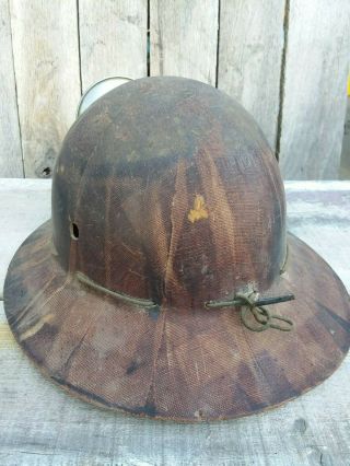 antique gold Miner ' s helmet with carbide lamp Autolite 5