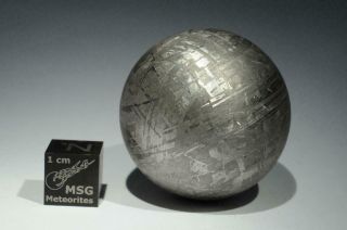 Gibeon iron Meteorite sphere weighing 146.  4 grams.  Polished and etched. 6