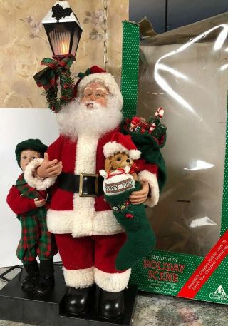 Holiday Creations Animated Santa W/ Boy Puppy Lighted Telescoping 36” Lamp Post