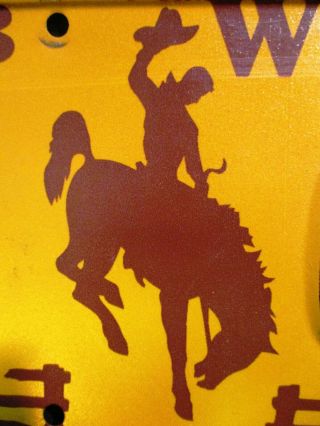 Vintage 1983 Wyoming License Plate W/ “cowboy On Bucking Bronco” Graphics Wow