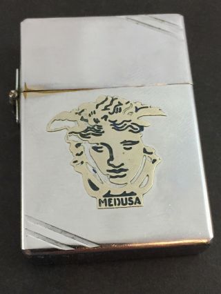 1934 - 35 Outside Hinge Zippo Lighter With Attached Medusa Metallique