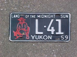 1959 Yukon Livery License Plate.  L - 41.  Land Of The Midnight Sun.