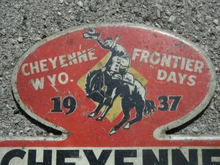 Good orig cond WYOMING dated 1937 CHEYENNE FRONTIER DAYS license plate topper WY 2