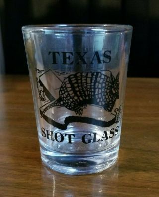 " Texas " 4 Oz Shot Glass With Armadillo And Texas - 4 Oz Measurements On Back