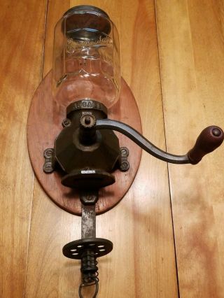 (7/13) Antique Wall Mount Arcade Crystal Coffee Grinder Ornate Cast Iron