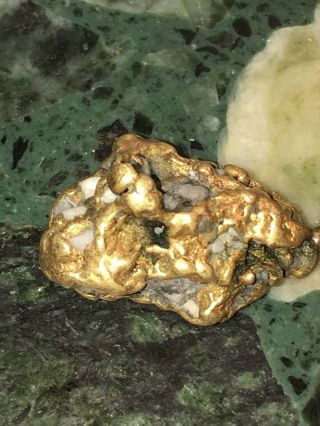 11.  9 Gram Gold Nugget With Bail And Quartz