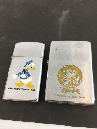 2 1972 Disney Zippo Lighters - Slim Donald Duck & Full Size Mickey Mouse