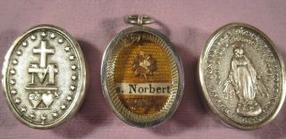 Ornate Silver Locket Case With A Relic Of St.  Norbert Of Xanten.